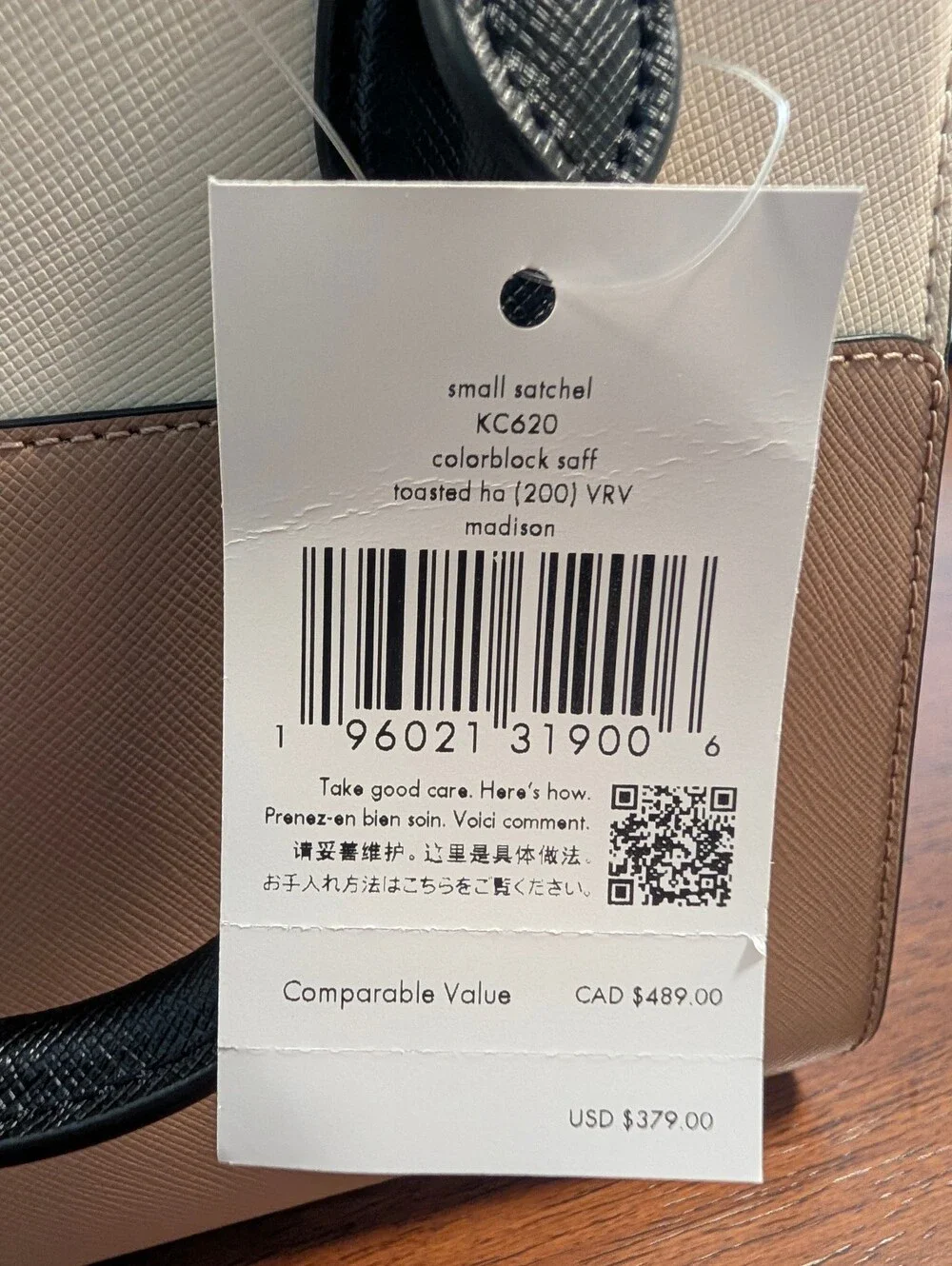 kate spade two-tone cream and beige satchel with black handles